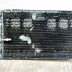 Radiator de climă cu punctele de reparație vizibile